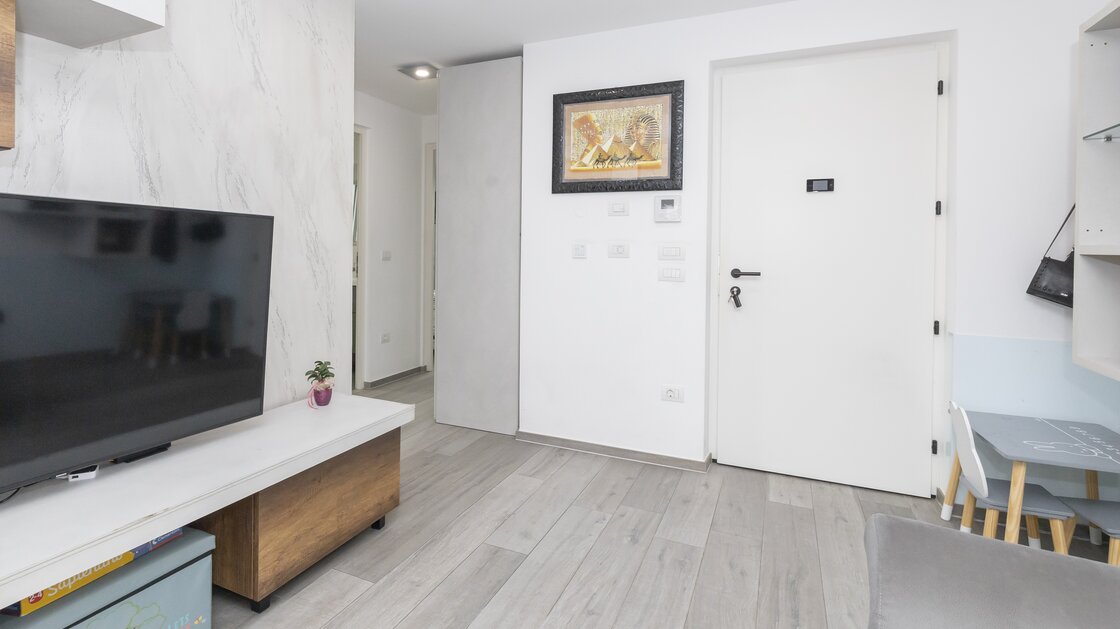 Neuwertige Dreizimmerwohnung mit Privatgarten in zentraler Lage