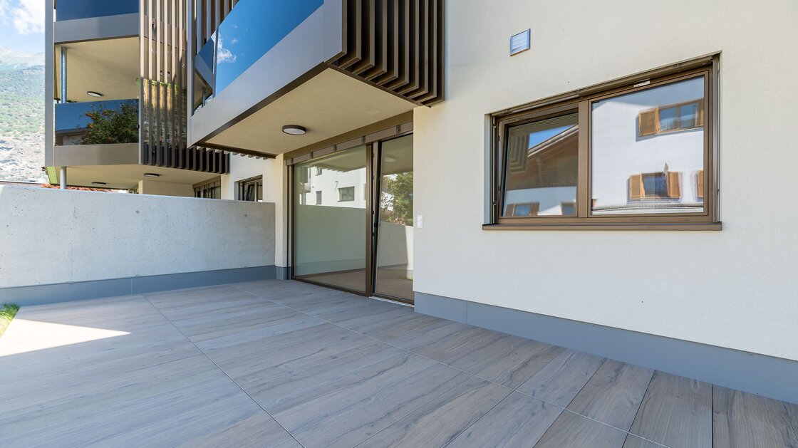 W2: Neue, große Vierzimmerwohnung mit Terrasse und Privatgarten