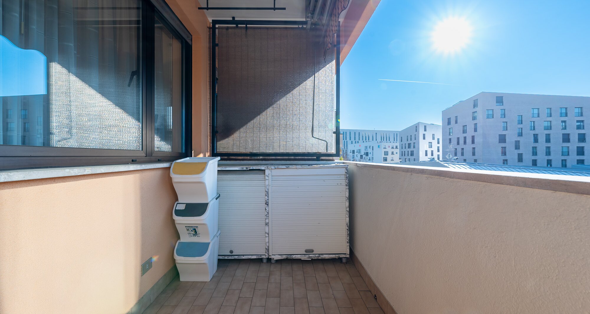 Ampio quadrilocale con terrazza e vista libera, piano alto