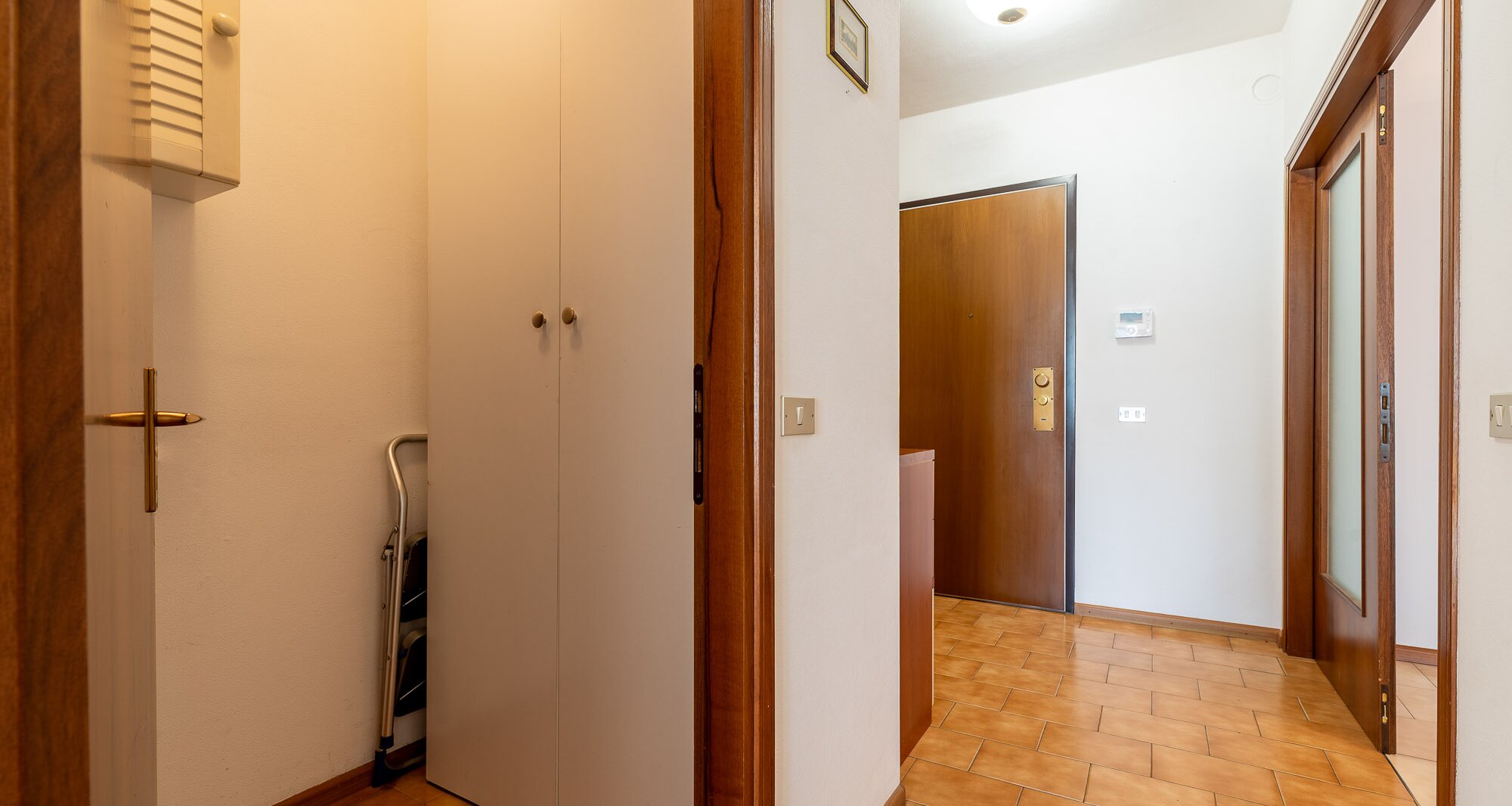 Ampio quadrilocale con terrazza e vista libera, piano alto