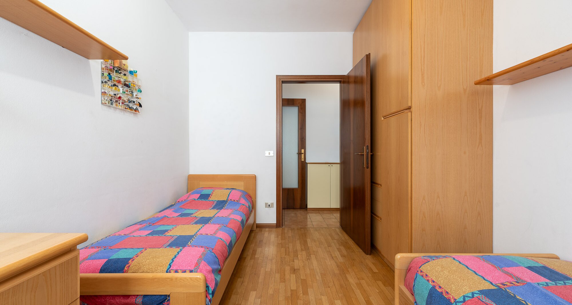 Ampio quadrilocale con terrazza e vista libera, piano alto