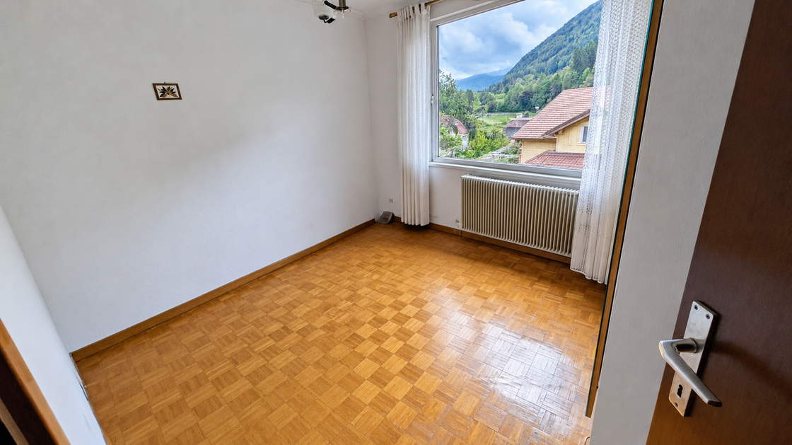 Ampio trilocale con balcone e vista libera