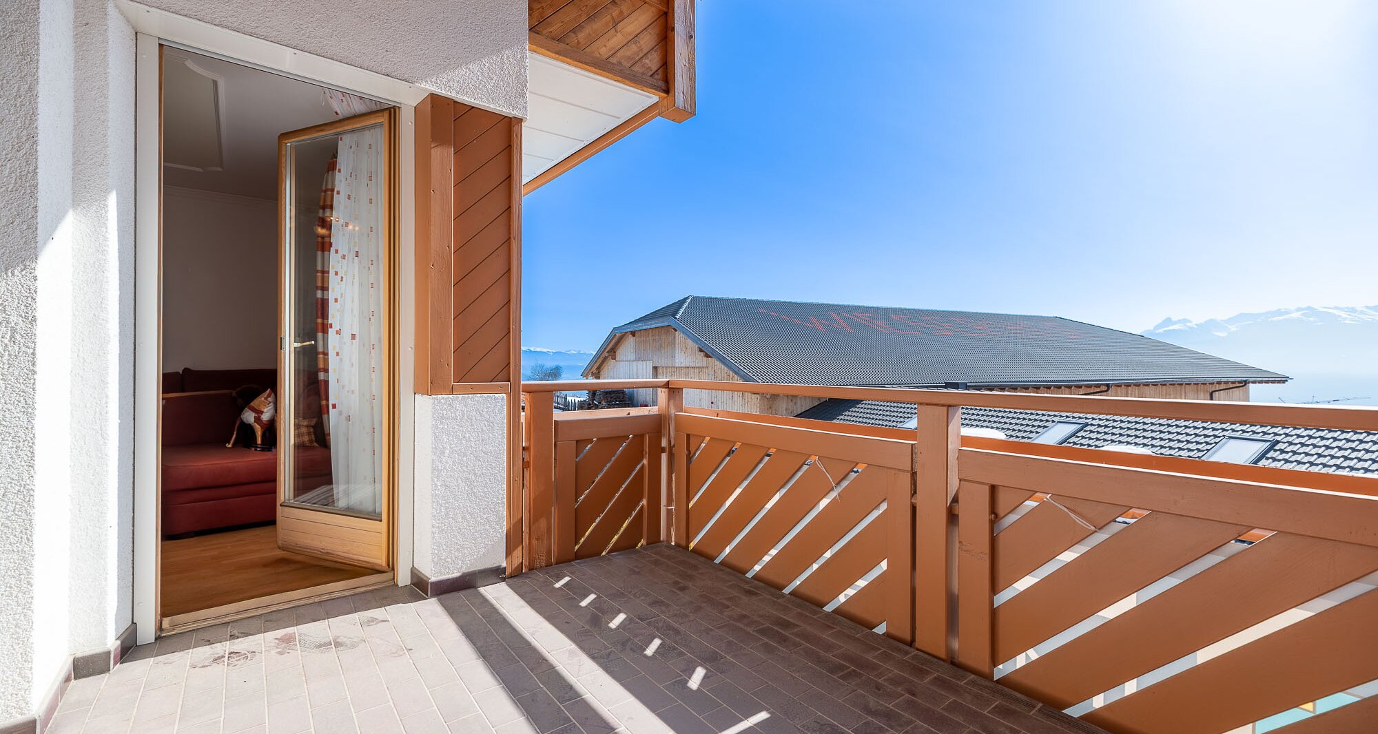 Sunny terraced house with charm and an alpine living feel