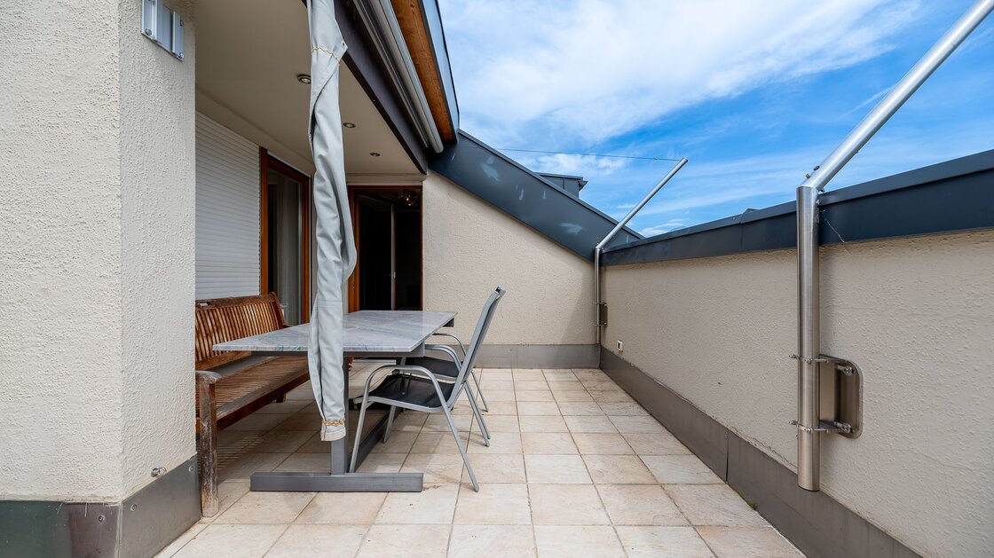 Esclusivo attico con terrazza e vista panoramica in posizione privilegiata