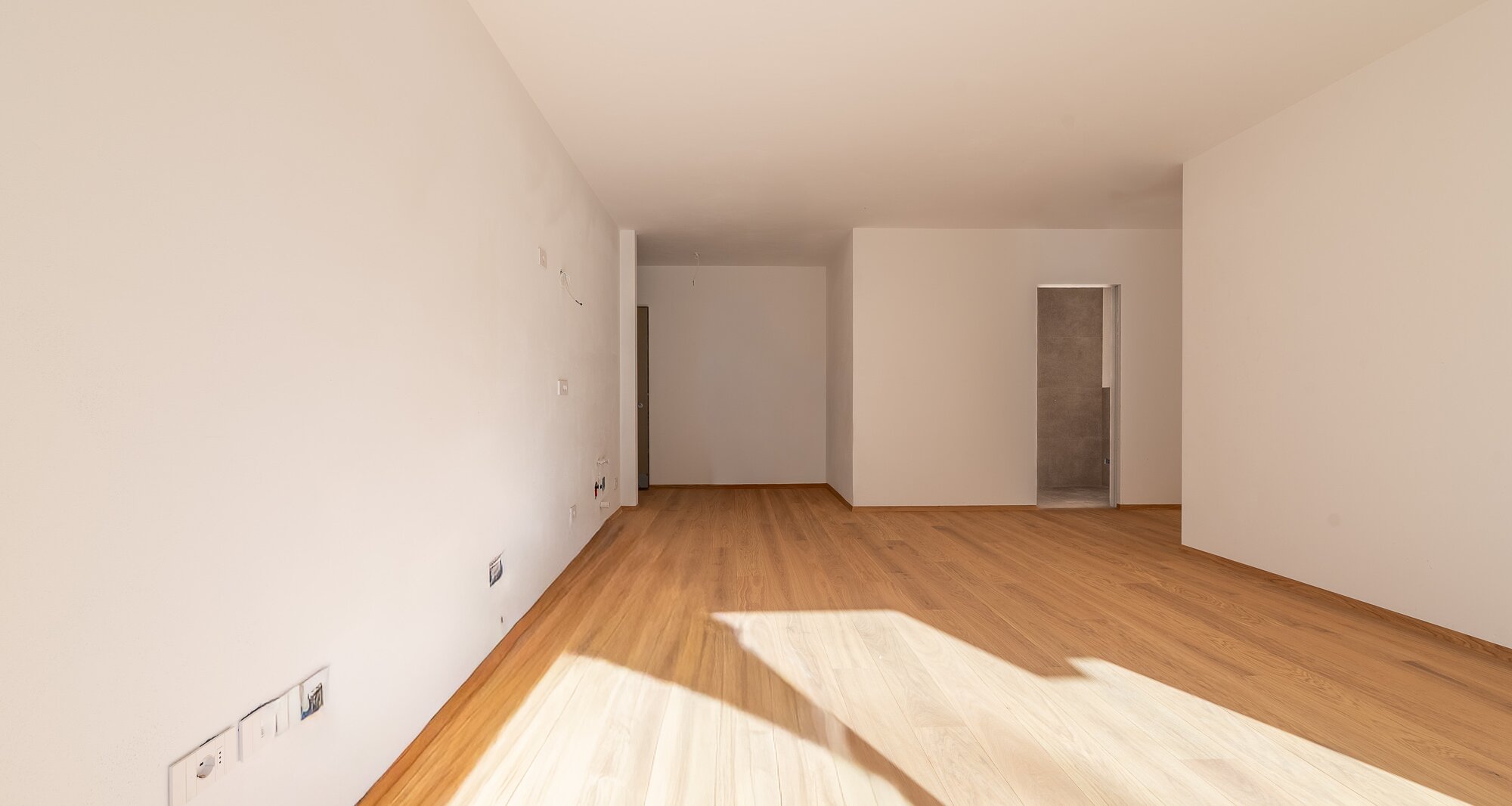 B: Nuovo trilocale con terrazza e giardino privato