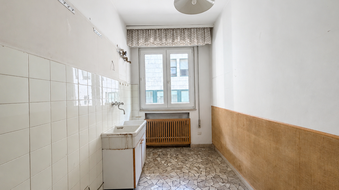 Appartamento da ristrutturare con balcone e potenziale di valorizzazione
