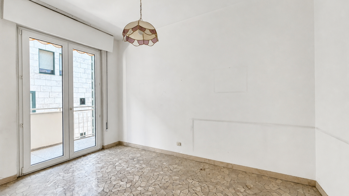 Appartamento da ristrutturare con balcone e potenziale di valorizzazione