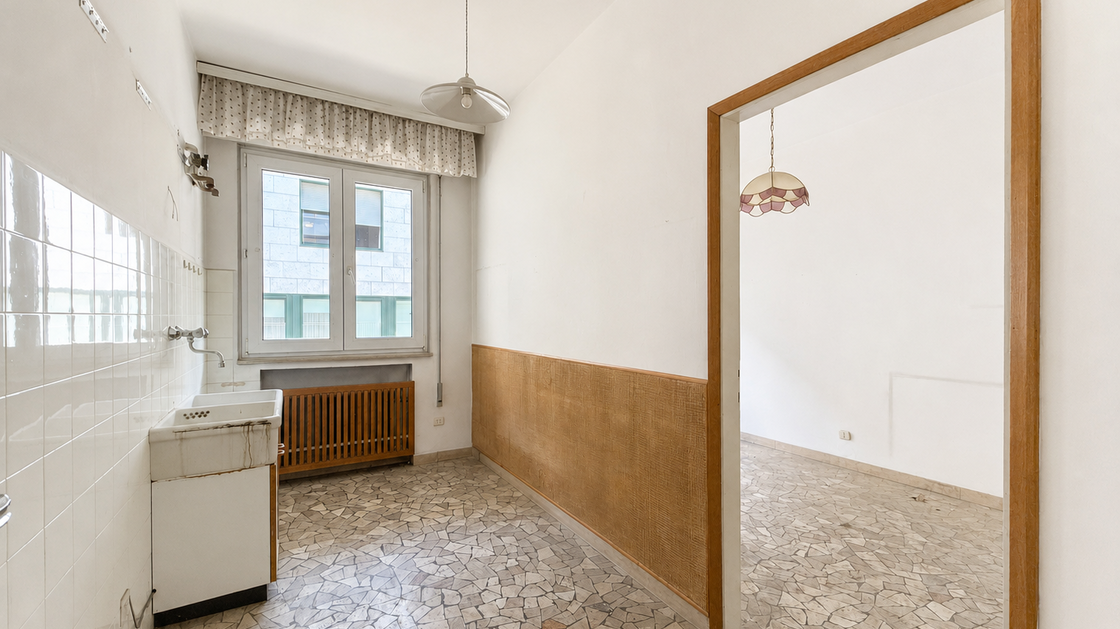 Appartamento da ristrutturare con balcone e potenziale di valorizzazione