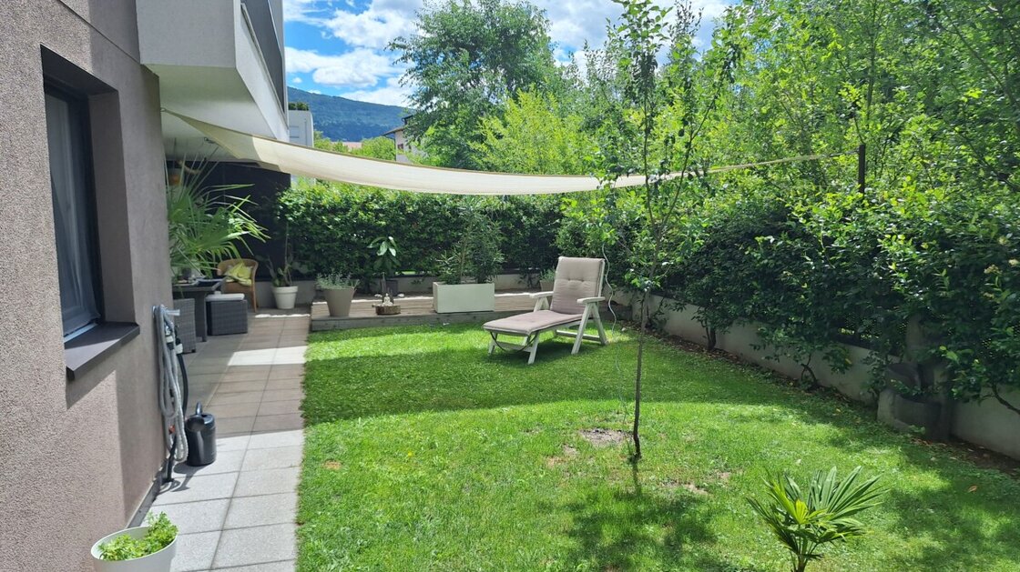 Quadrilocale moderno con giardino privato