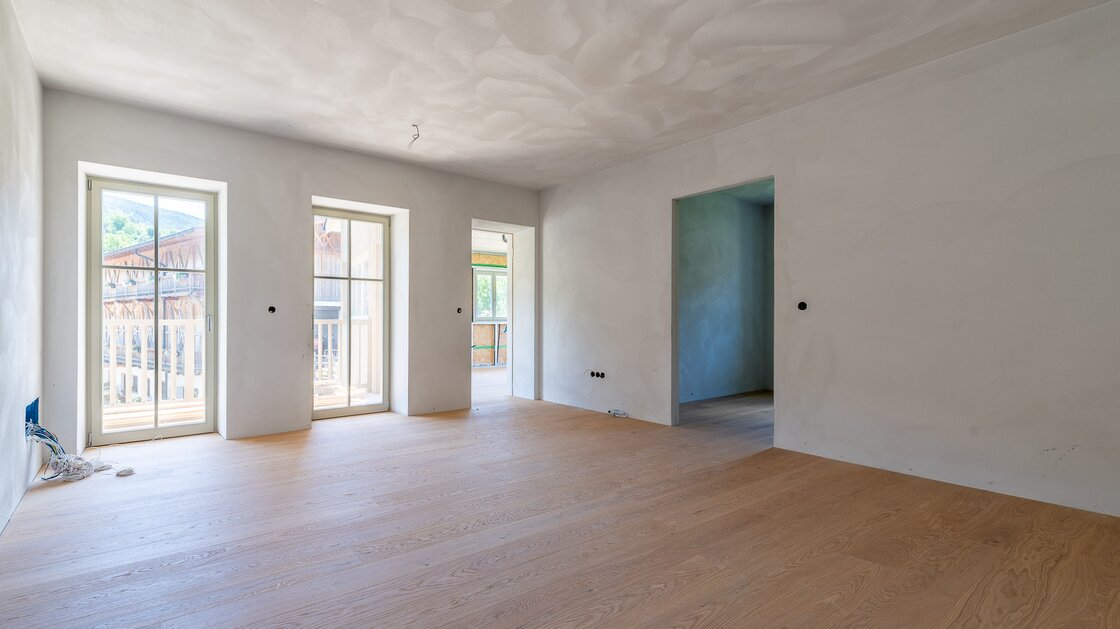 A3: Neue Vierzimmerwohnung im hohen Stockwerk mit ca. 400 m² Privatgarten