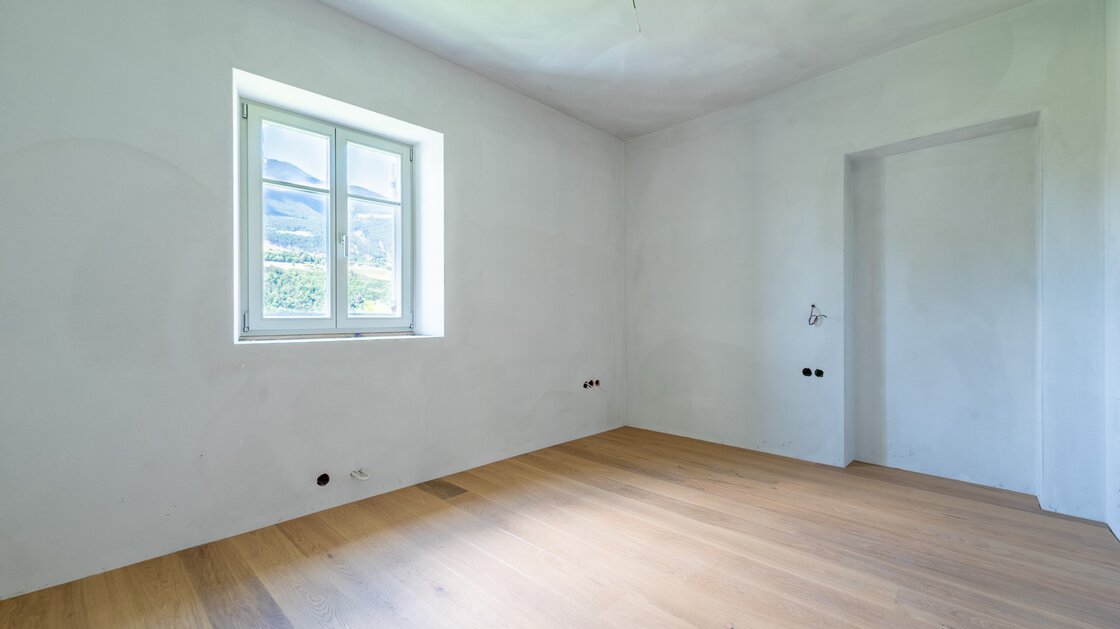 A3: Neue Vierzimmerwohnung im hohen Stockwerk mit ca. 400 m² Privatgarten