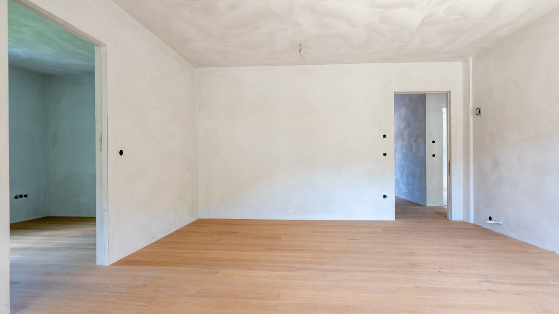 A3: Neue Vierzimmerwohnung im hohen Stockwerk mit ca. 400 m² Privatgarten