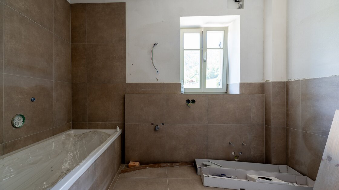 A3: Neue Vierzimmerwohnung im hohen Stockwerk mit ca. 400 m² Privatgarten