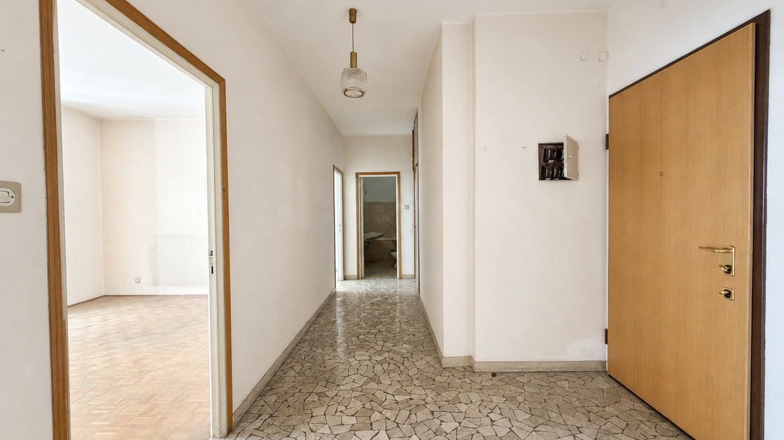 Appartamento da ristrutturare con balcone e potenziale di valorizzazione